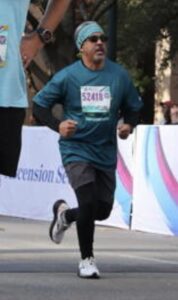 Author running in the Austin Marathon 5K